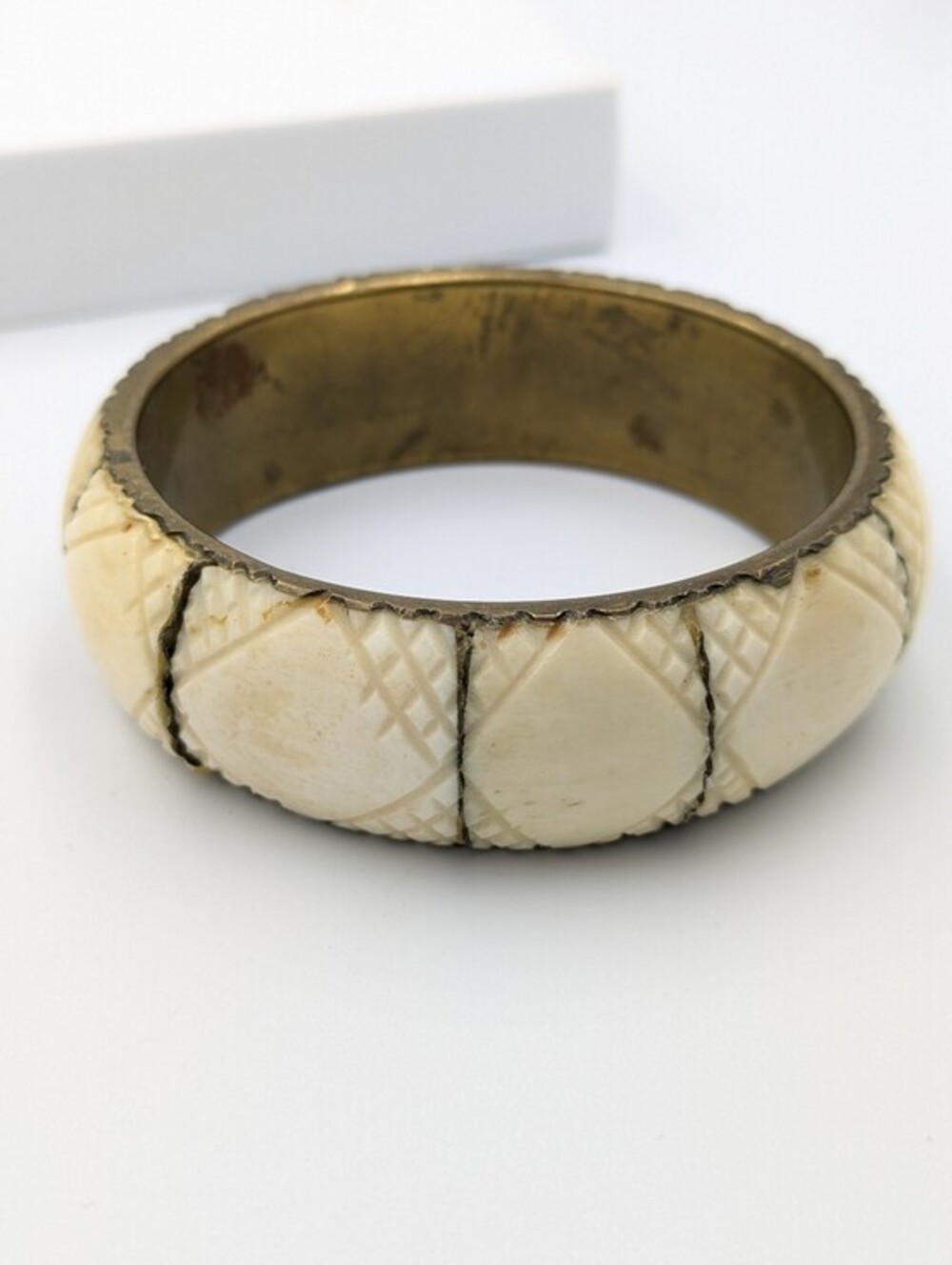 Vintage brass and hand carved bone bangle bracelet